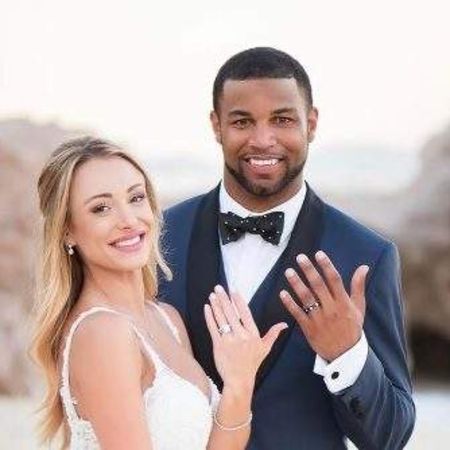 Elise and her partner, Tate showing their engagement ring